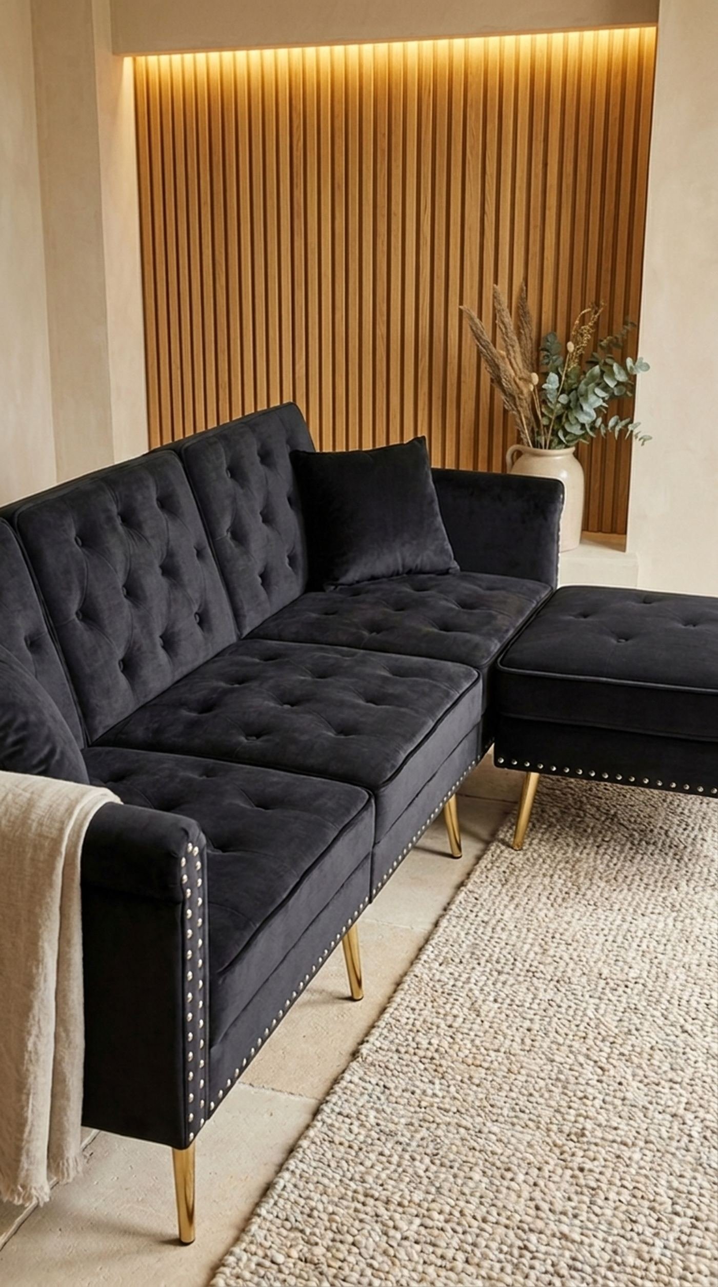 Tufted velvet sectional with brass legs